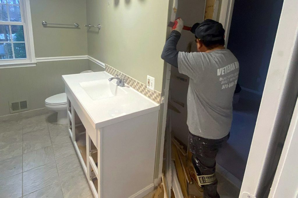 Veteran Built Homes Handyman framing out closet in bathroom in Northern Virginia Home